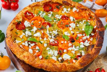 Rustic pie with coloured tomatoes and mustard